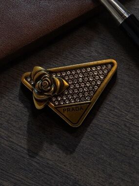 Prada UPCYCLED Gold-Tone brooch with   Rose